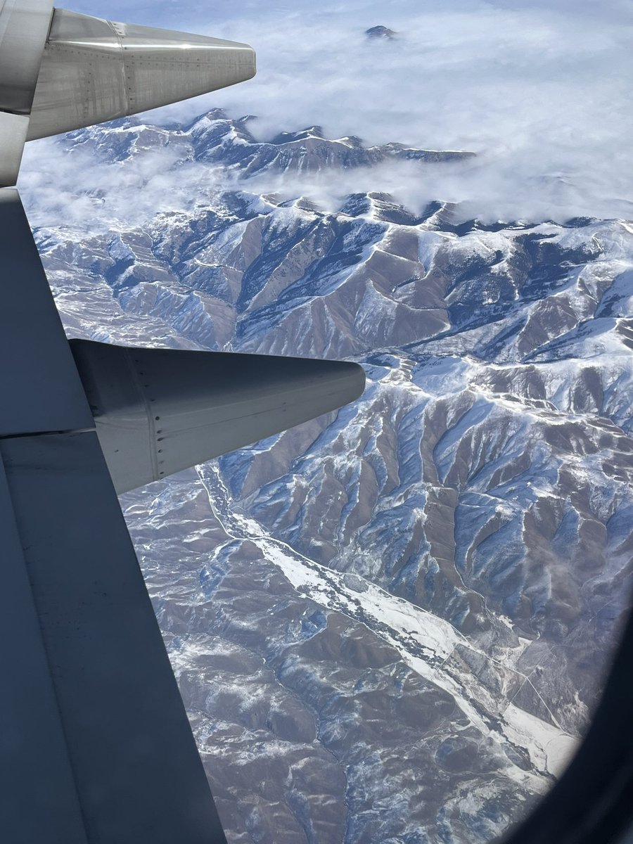 stricklandaniel's tweet photo. Enjoy these terrain reference photos from my flight! One of these shots showcases snow melting on the sunny side of the mountains. 😍 https://t.co/um2gvEXGn4