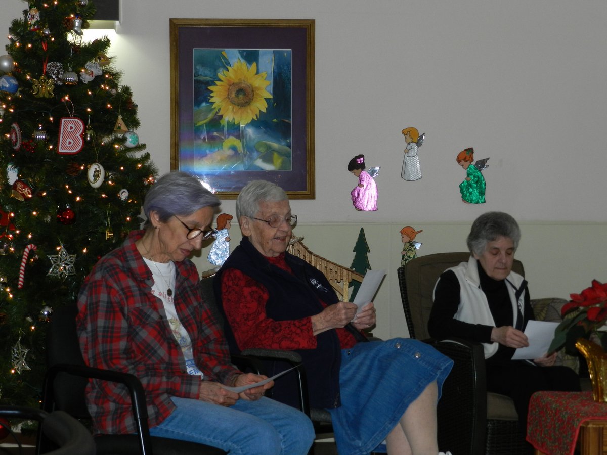 OSBChicago's tweet photo. The  Sisters gathered around the Christmas tree on Wednesday to celebrate  the Feast of St. John and enjoy some Christmas carol trivia. https://t.co/l194xj787M