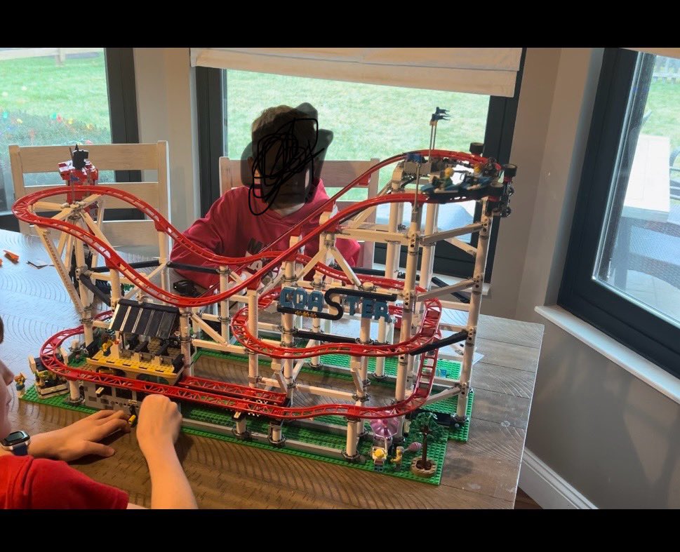 cubeut14's tweet photo. @LEGO_Group My 10 year old JJ finished the Lego coaster he got for Christmas!  And my 7 year old Jackson with his finished haul that included Optimus Prime and some Dragons Rising. https://t.co/12t4yCkRFx
