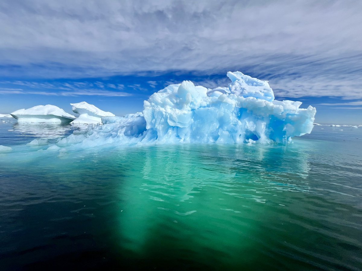 RobSuisted's tweet photo. Some beautiful ice today. Water is becoming very green and rich with phytoplankton &amp; algae bloom, hence why we saw countless whales down near the Antarctic Circle 66 degrees 33’S. #Antarctica https://t.co/5QdsrTtVVc