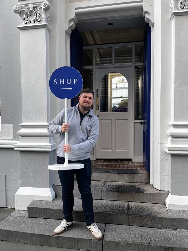Happy New Year. 

We're open once again for tours and shop visits – and thanks to Adrian's exciting and challenging new role, our shop sign is three feet higher than it used to be this year. Keep those hands steady Adrian – 361 days to go.