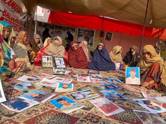 MahrangBaloch_'s tweet photo. This isn't an exhibition of pictures; these mothers are gazing at images of their children, victims of enforced disappearance. These pictures serve as the last keepsakes of their sons.
If this is not the genocide of a nation, what is it?
#StopBalochGenocide 
#MarchAgainstBalochGenocide