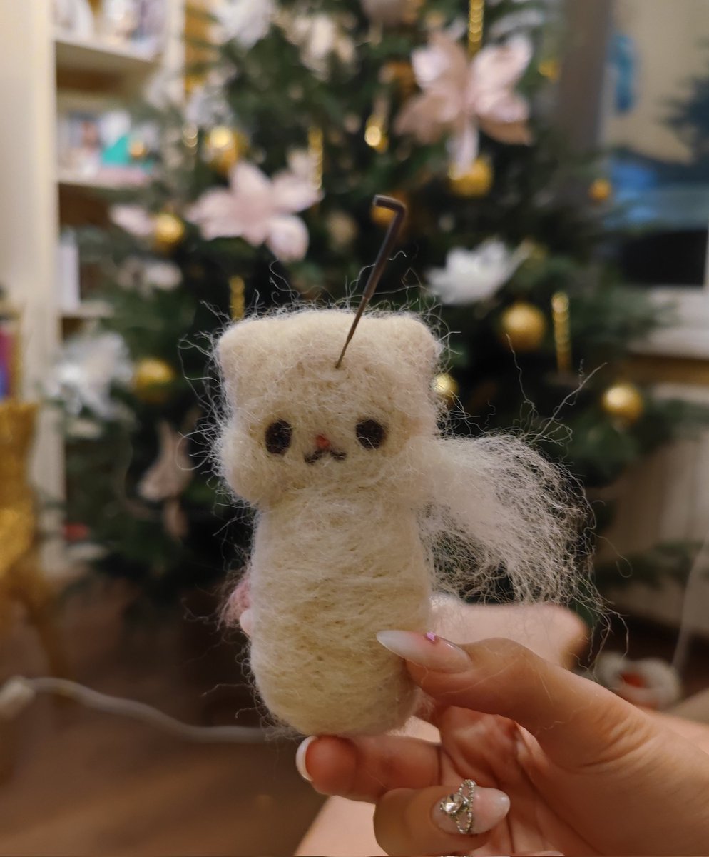 New Year holidays are ideal for dry felting a woolen kitten
