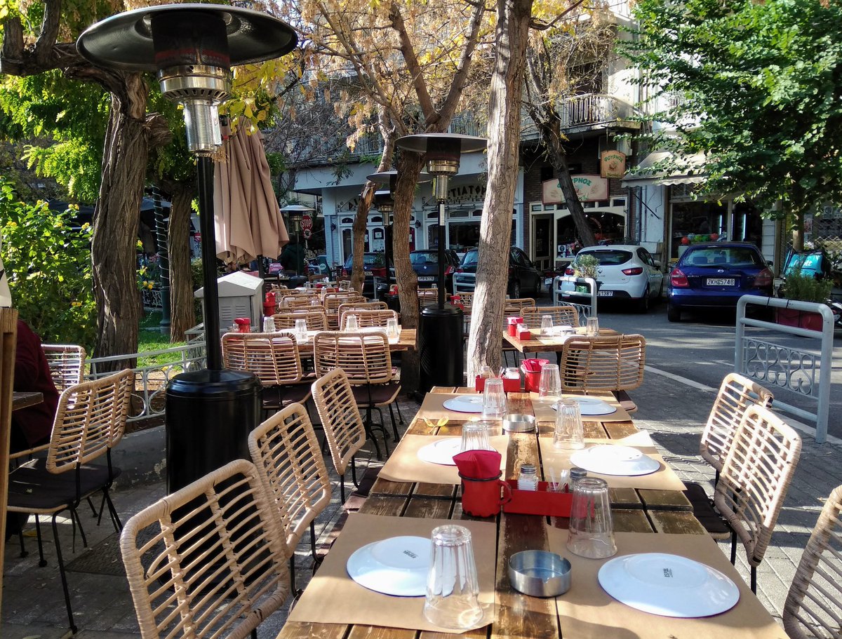 nomadpossum's tweet photo. Tavernas this morning getting their outdoor lunch tables ready, 18 degrees and sunny. Saw a half dozen Greeks in t-shirts today, finally embracing the weather instead of the season. 😁🇬🇷 #Athens #GreekWinter https://t.co/yNDKzmIhkG