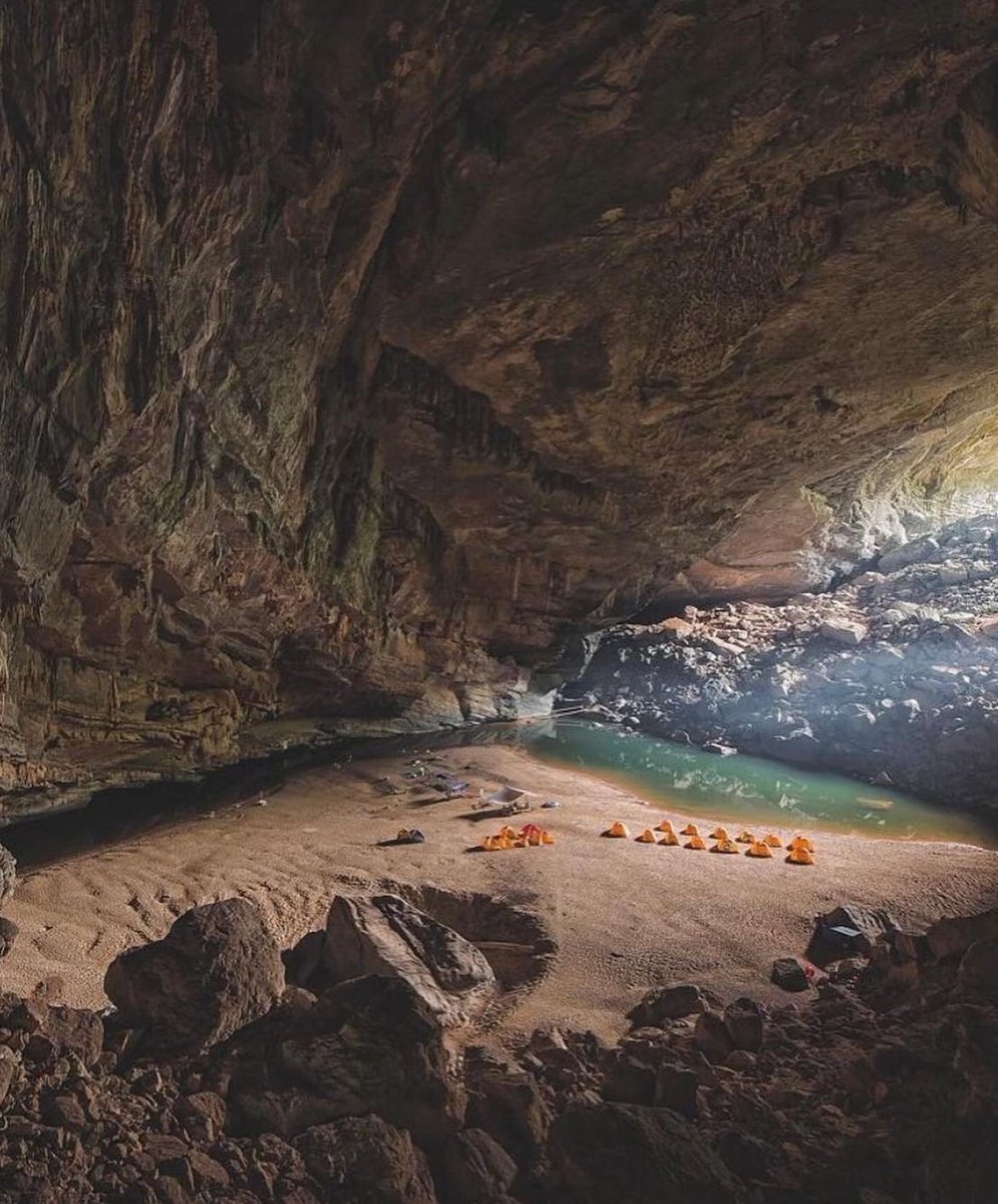 In Vietnam, Hang En is the world's third-largest cave and has its own climate, river, and jungle. It is currently ranked as the third-largest cave globally after Hang Son Doong and Deer Cave in Malaysia. This impressive cavern is quickly gaining recognition and becoming one of