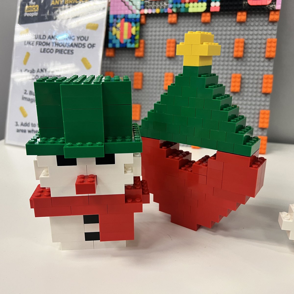 thebrickpeople_'s tweet photo. WEEK 5: For week 5 the pop up shop build challenge was “Things found at the North Pole”. Congratulations to Nick (1st with the snowman and heart tree), Laura D (2nd with the snowman in a blue hat) and Chris R (3rd with the double candy canes)! #lego #legobuildchallenge https://t.co/zmRJq4eqRF