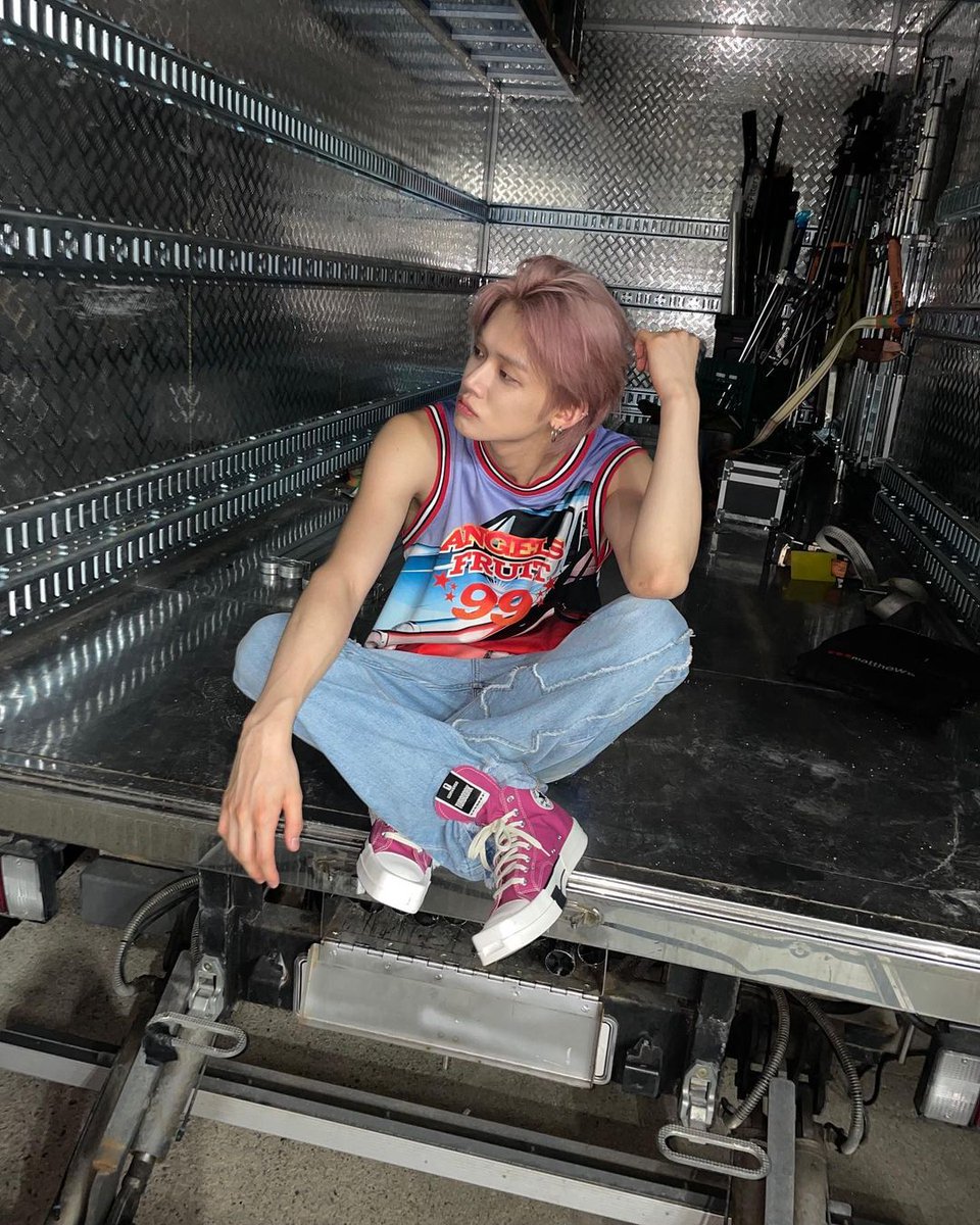Yeonjuhun's tweet photo. Sporting a racing car themed jersey and  jeans for a laid-back vibe, while also rocking my new fresh violet hair. https://t.co/NHFZTEvLuy