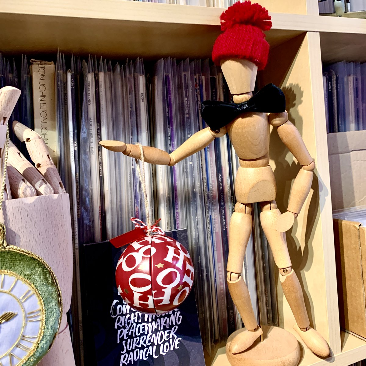 MR PLANKTON - our very own office mascot &amp; self appointed guardian of the precious vinyl is enjoying wearing his brand new bobble hat which he got for Christmas. He's now happily warm &amp; cozy! HAPPY CHRISTMAS WEEK #ChristmasPresent #woollen #mascot #vinylcollection  #hats #office