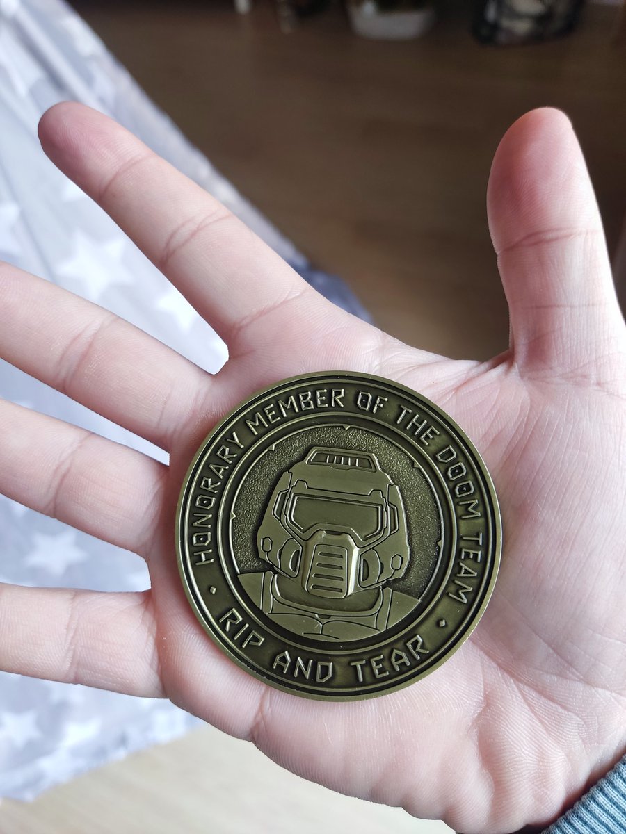 DrugodTV's tweet photo. Thank you @idSoftware and @Bethesda, with a special mention to Kevin Cloud, for naming me an honorary member of the #Doom community and sending this amazing medal in appreciation. Truly a dream come true! Rip and Tear! #Doom30 https://t.co/fWDvxvbnuN