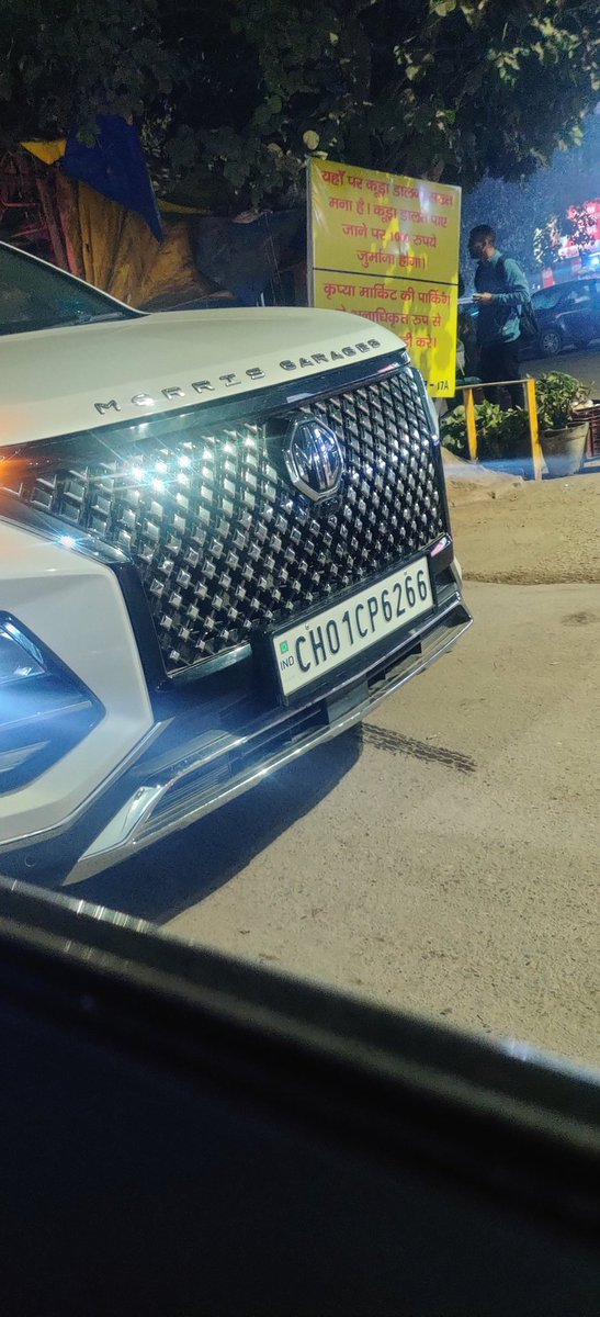 This guy was Parking in the middle of the road and sipping a cup of tea. People like them are a menace to sector 17 A roads, one can see such type of people on the roadside causing traffic every now and then who refuse to listen to anybody  <a href="/TrafficGGM/">Gurugram Traffic Police</a> should take some actions.