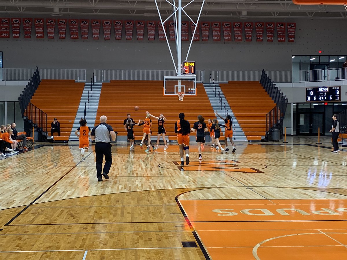 The history books will show Rae Kayla Phillips made the first basket, a 3 in the amazing new gym at Moorhead!