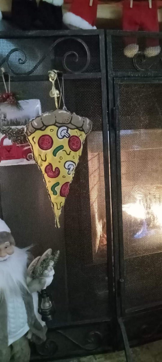 You all know how artsy our daughter Kayla is. So here's just something else she made for me for Christmas form an old shirt her brother grew out of.  A little Pizza pillow ornament.