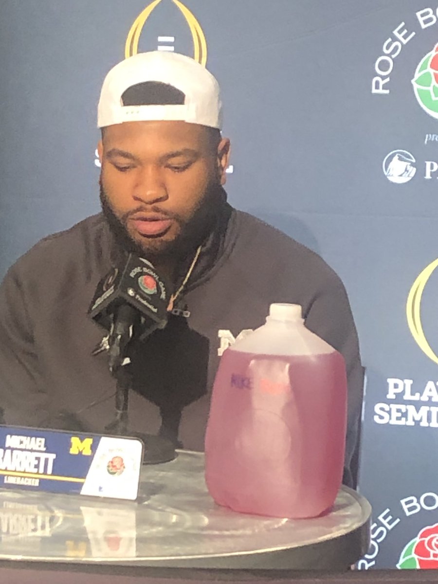 _ZachShaw's tweet photo. Michael Barrett sporting a BORG (ball out rage gallon) full of electrolytes today at the Rose Bowl media session

Also, BORGs are on the rise outside of sports, but the BO is blackout and it isn’t usually electrolytes in there lol https://t.co/NEAIOWoOuR