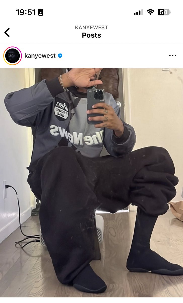 genojenson's tweet photo. Is Kanye wearing an old Pompey goalkeeper kit??? https://t.co/ME0vknFpWI