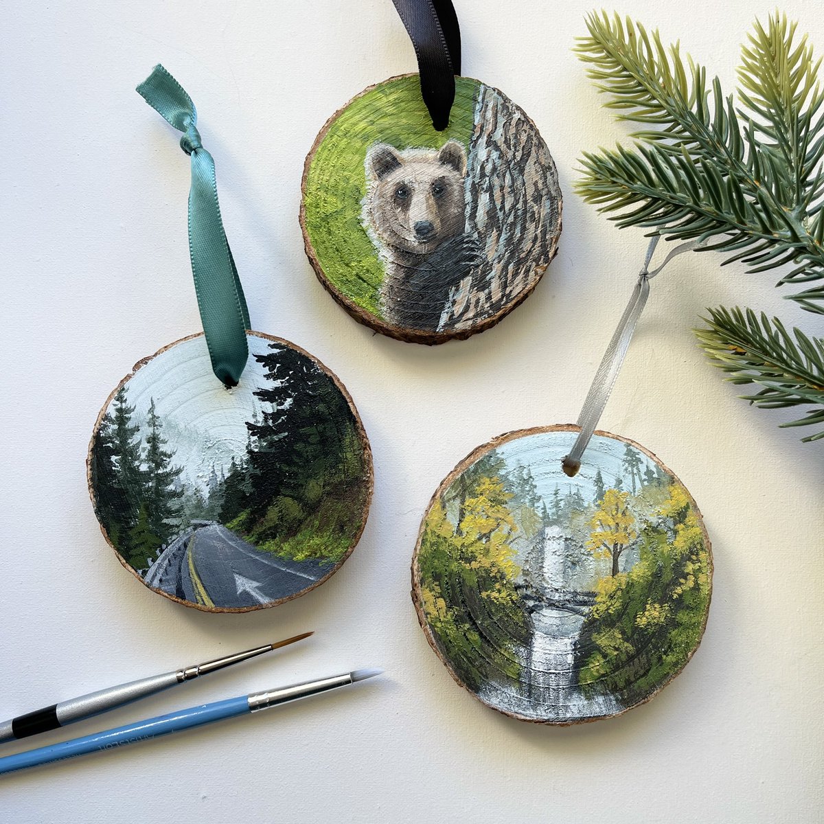 I painted a few little wood slice ornaments as Christmas gifts for some loved ones. ❤️ all about 3 inches across and done with acrylic paints. I wish I would’ve had time to paint more for everyone, but I’m proud of the three I was able to finish this year.