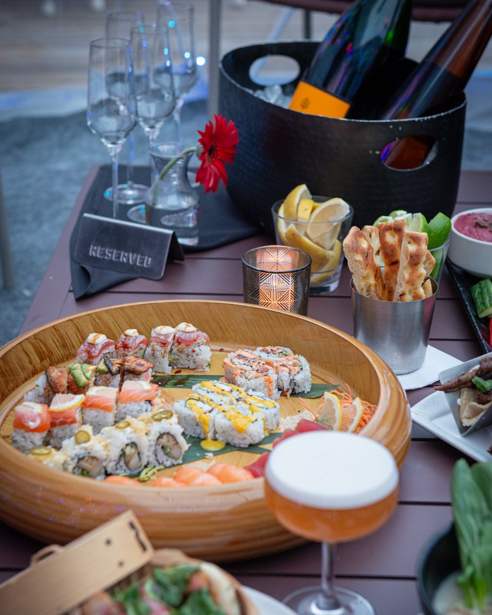 Delight in the enchanting days between Christmas and New Year's - an ideal time for relaxation and joyous moments with friends at IO Godfrey! Visit exploretock.com/iogodfrey for an unforgettable experience.