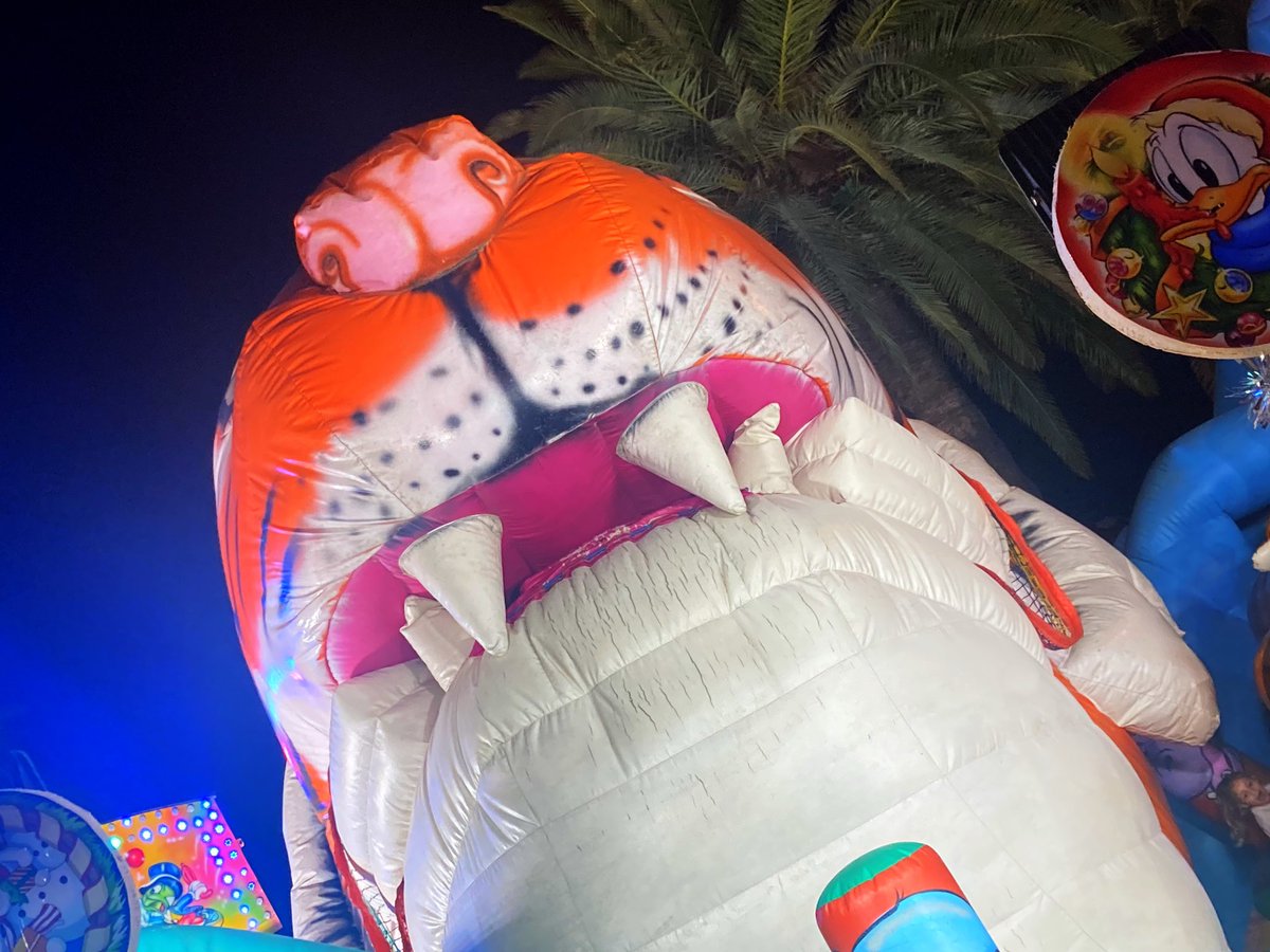 WhosKateStrange's tweet photo. I have all the envy for this fairground inflatable Tiger opening & closing jaw & giant tongue slide 🐯 #Ayemonte #Andalusia https://t.co/GRcD1MotQP