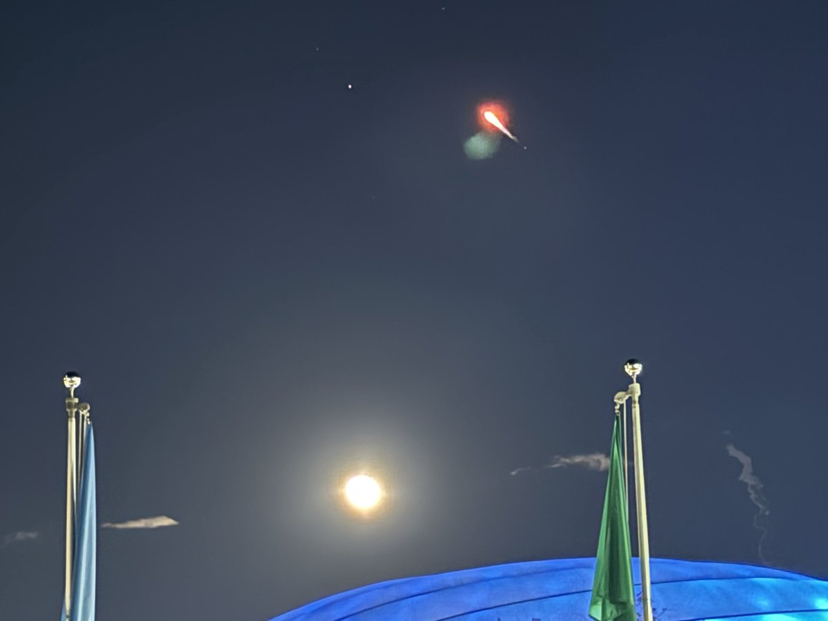 .<a href="/SpaceX/">SpaceX</a> with a full moon over <a href="/Disney/">Disney</a>