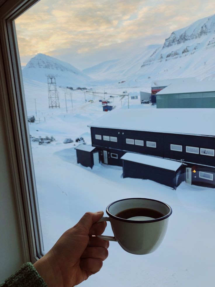 Sipping serenity in Longyearbyen with my morning brew ☕. Here's to chilly mornings and warm coffee! #ArcticJava #MorningMoments #CoffeeWithAView