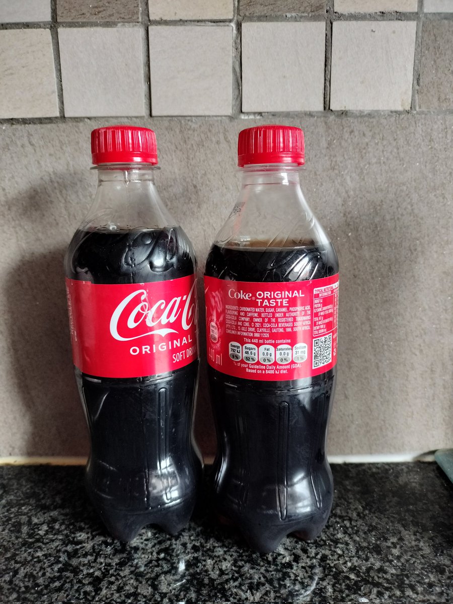 rialdap's tweet photo. @CocaCola_ZA two cokes bought at the same time at the same place, both still sealed, not with the same amount of coke in. How does this work? https://t.co/csLP2XmH4r