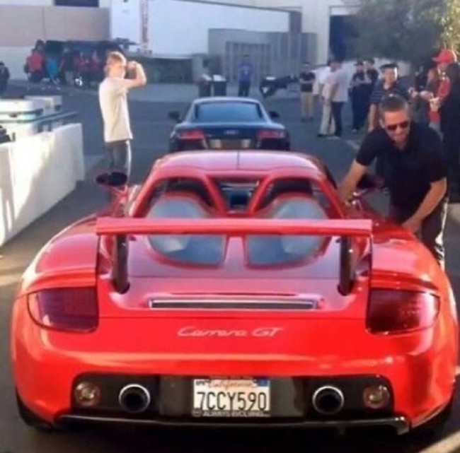 Actor Paul Walker getting into the car that would crash and kill him later that day.