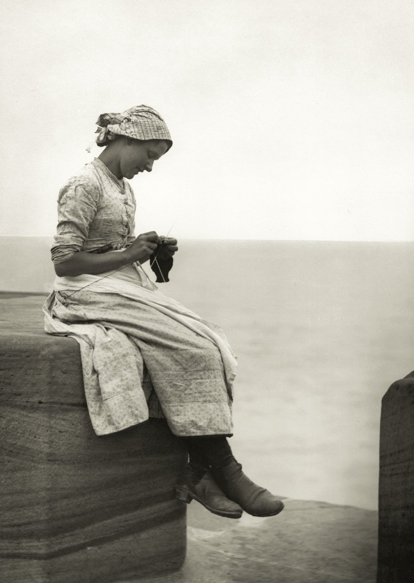 Girl knitting a sock on Whitby Pier, North Yorkshire, England, ca. 1889 - by Francis Meadow Sutcliffe (1853 - 1941), English