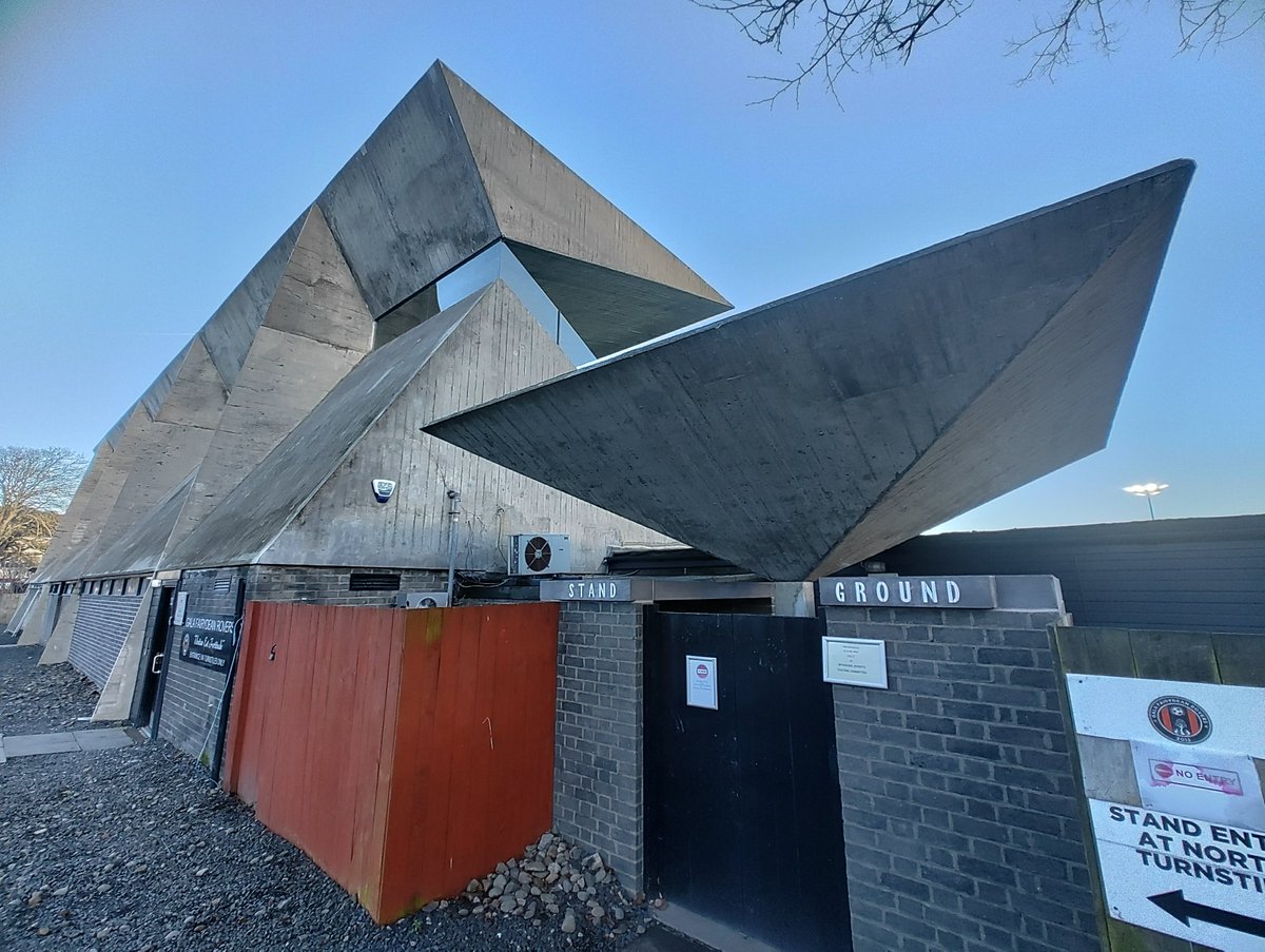 DreadHops's tweet photo. 26/12/23 Netherdale, Galashiels
@fairydeanrovers 2 v 0 @OfficialBRFC 
@OfficialSLFL
[Tier 5] Entry: £10 Att. ? + 1 Dog
A brutalist marvel. This ground exceeded all expectations. Wonderful architecture &amp; outstanding scenery. #groundhopping #nonleaguecrowds #footballgrounds https://t.co/s7wQWn2Kgt