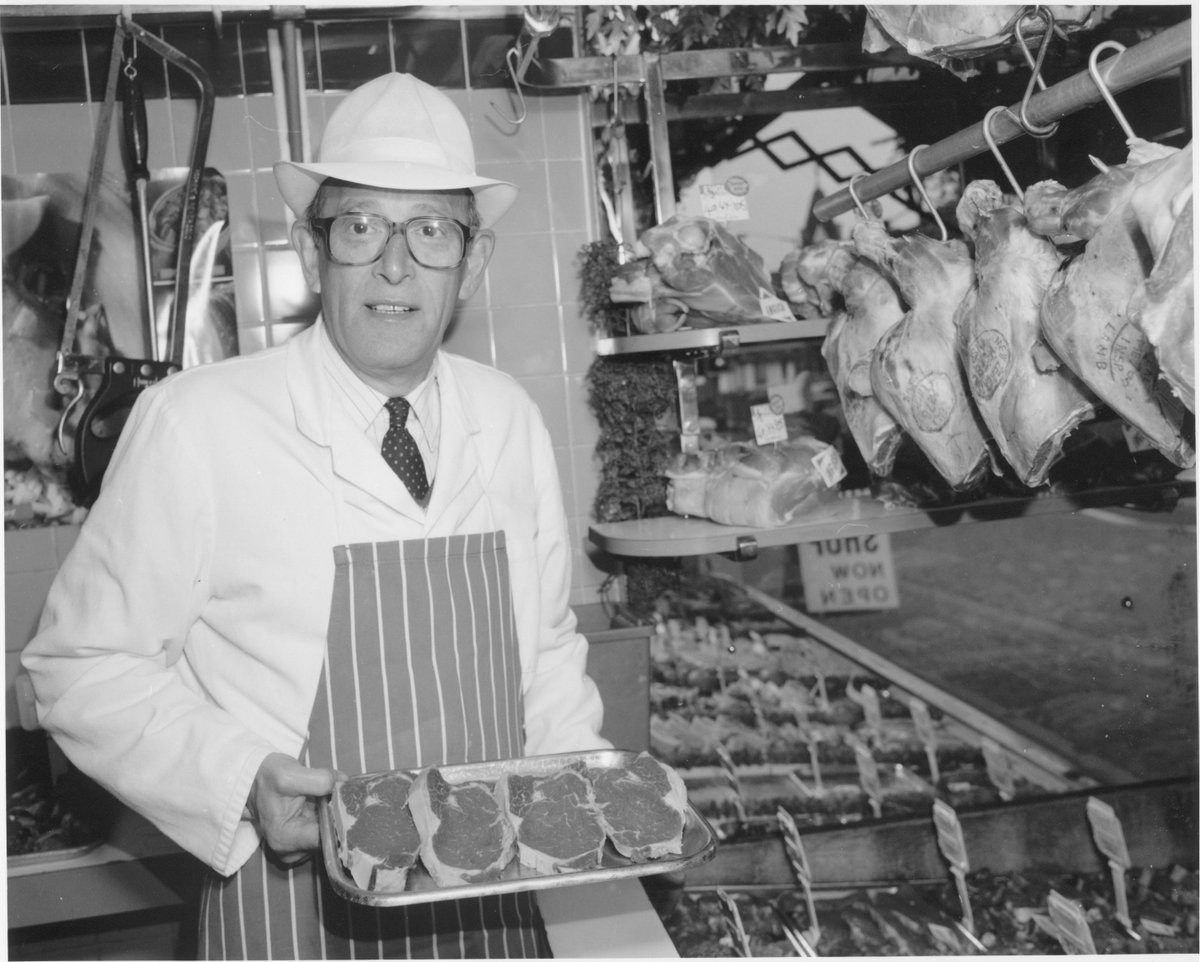 Another #FlashbackFriday photo for you! This is one of 50 photos taken in 1995 to celebrate 50 years of @LoughtonCameraClub. It shows John Stuchfield in his butcher’s shop at 168 High Road. Photograph by Tony Reeves. #Loughton