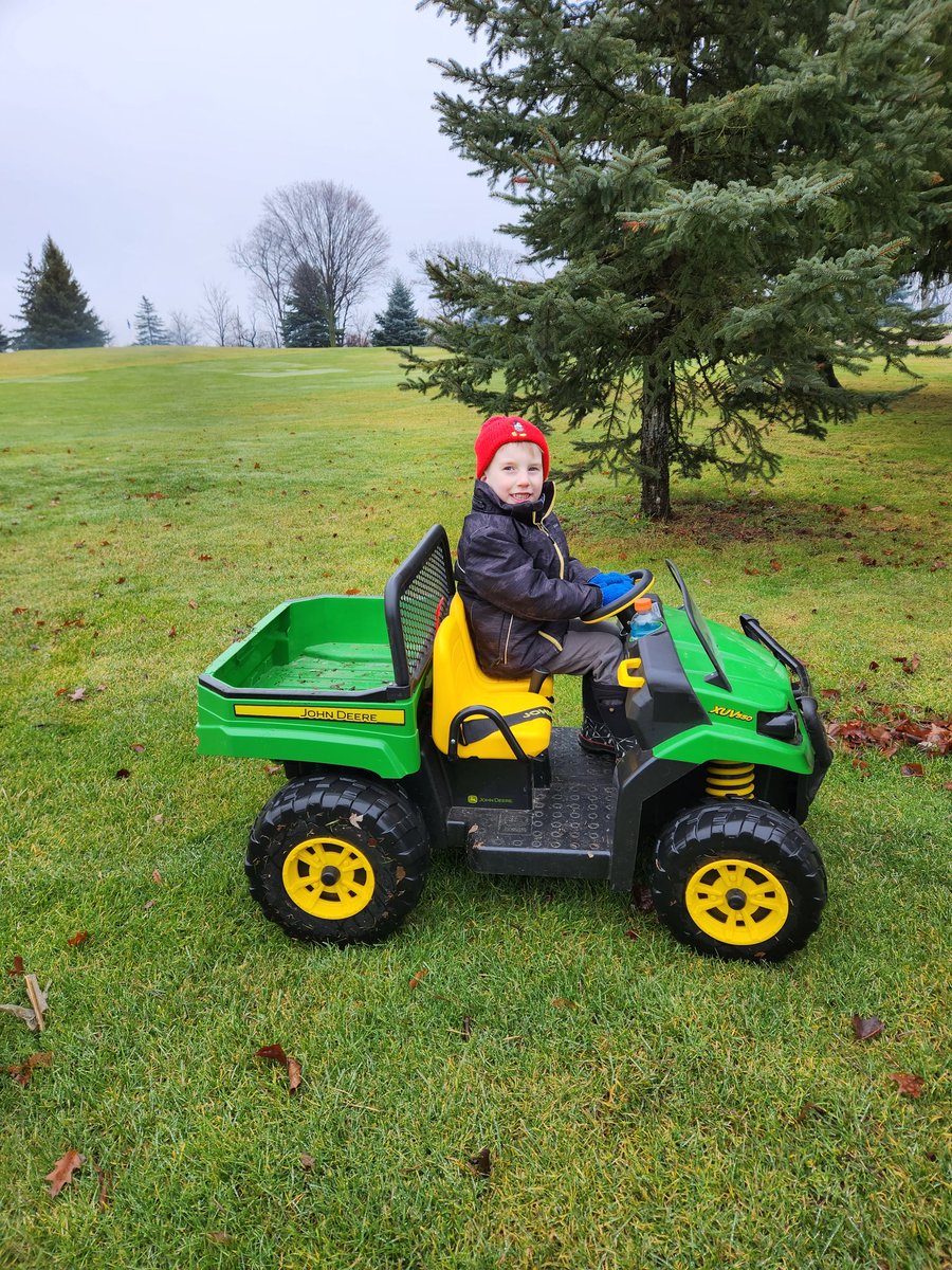 RyanSurettePGC's tweet photo. There are many unique things about being a golf course Superintendent, but having 24/7 access to a golf course where you can teach your son how to pick up sticks in his mini gator and have a fire is definitely one of the better ones. https://t.co/PcTzYzaNUZ