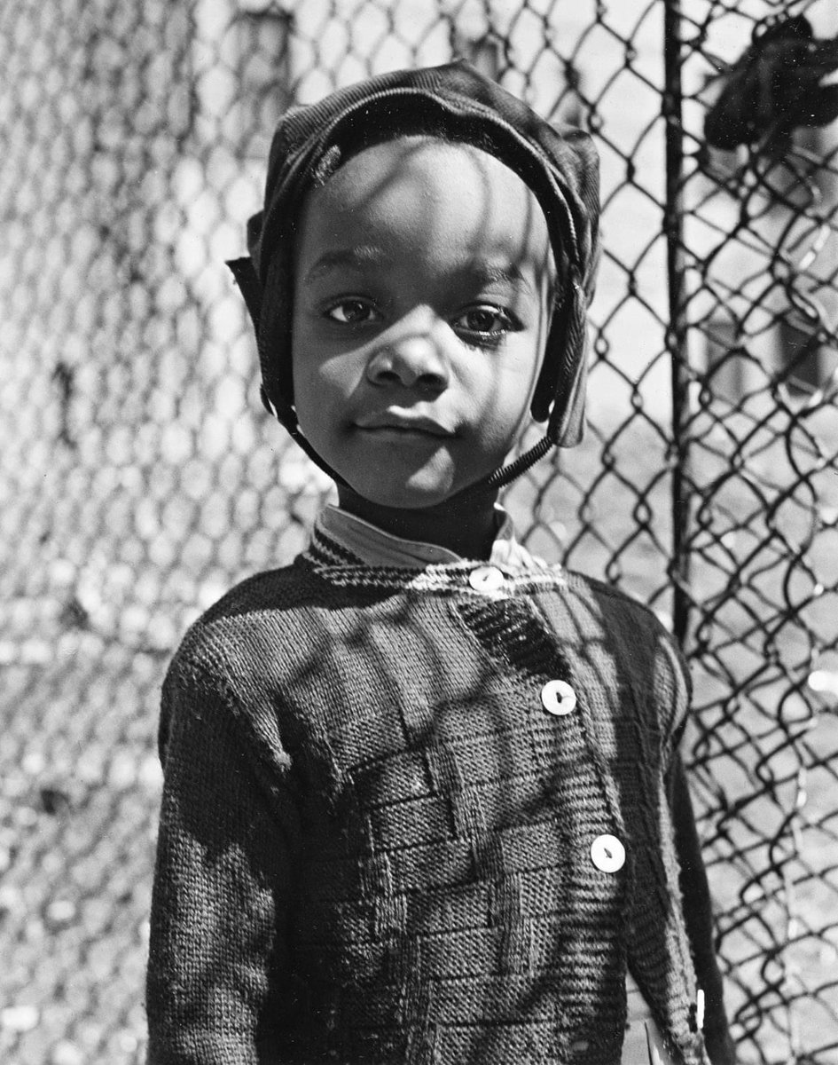Walter Rosenblum. Smiling child, 105th Street, New York, 1952.