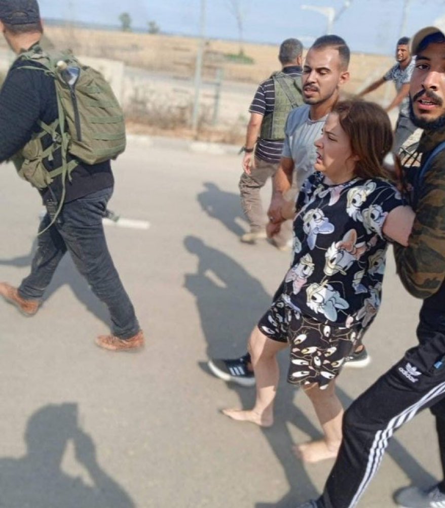 AvivaKlompas's tweet photo. A photo from Oct 7 showing an Israeli woman being abducted barefoot by Palestinian terrorists. 

These assholes don’t wear uniforms. They target unarmed civilians. And they photographed it all because they’re proud to be murderers, rapists, and kidnappers. https://t.co/NJ0bhgTBBN