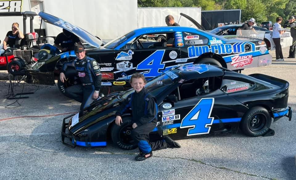 Yesterday we, along with his uncle and Papa, surprised one of our super fans, Wesley, with a visit to our race shop and gave him one of my race doors. Wesley races bandoleros and has his #4 bando looking similar to my SLM. Wesley was all smiles and definitely surprised.