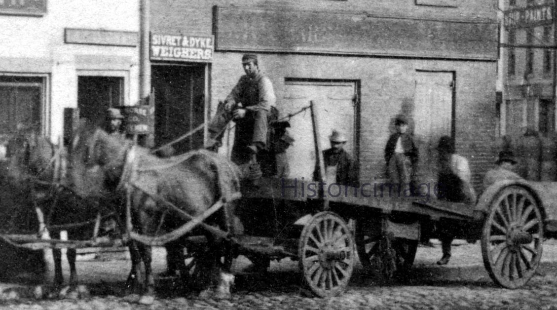Historicimage's tweet photo. C. 1870 Custom House Restaurant, Boston with staff outside. Also, the offices of ' C. R. Morse and Co. Truckmen ' and ' Henry G. Hawes ' importers of salt and Claret. Photo by Rand & Latto of South Boston. #historicimage #Boston https://t.co/ul9HhX3YuA