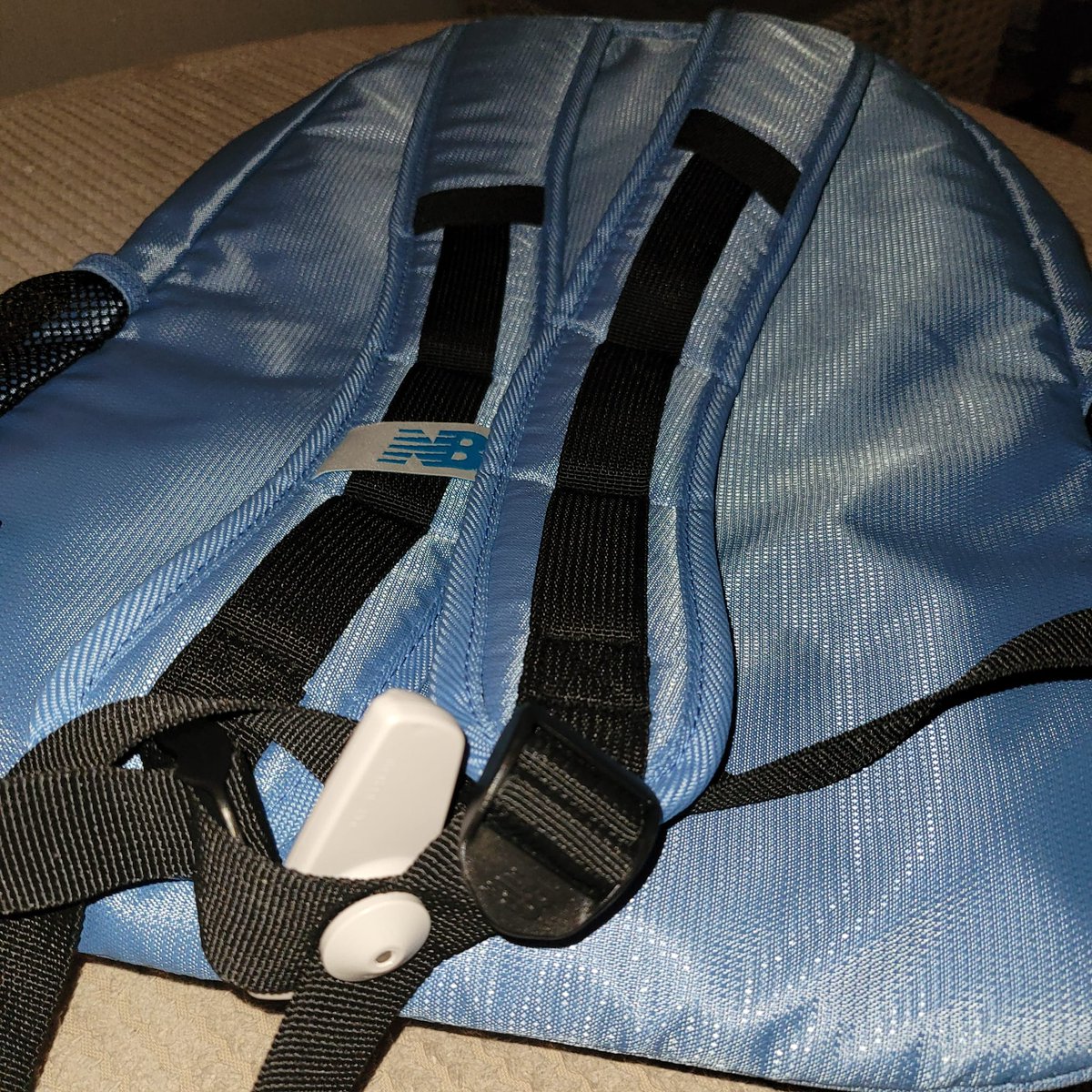 MrM0ses's tweet photo. Purchased a bag from @newbalance Wembley outlet and they packaged it with the security tag still on! I don't live in London so it's highly inconvenient. I have the receipt as proof of purchase, please can you advise what I'm supposed to do with this?#help  #CustomerService https://t.co/WCncHKZIQo