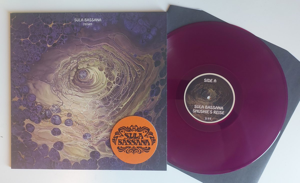 new on Feral Child SULA BASSANA 'Reisen' mauve wax LP w/bar coaster. two killer side long pieces of Berlin school kosmische, available direct from the label as of today. £18 + £4 uk pp | + £8 EU pp | +£10 rest of world pp paypal: thegreatpopsupplement@hotmail.com