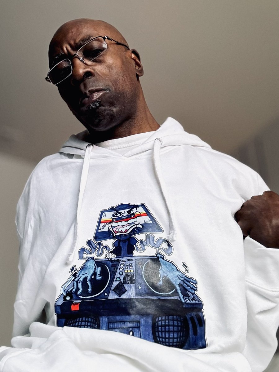 [image of a Black man wearing his logo sweatshirt.. Fezo da Mad One cassette tape as a DJ mixing on two turn tables] Be ya own model ha!! NEPHEW! You did the damn thing…. Ya can get yours at .. dasoulshop.creator-spring.com/listing/da-log… #DaSoulToucha