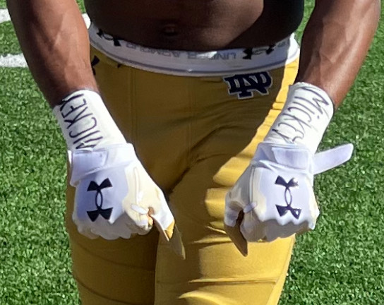 JayJayPost's tweet photo. Notre Dame defensive back @BMoe_21 has "MICKEY" on his wrist tape today. Fellow cornerback Jaden Mickey's mother, Nilka, sadly passed away earlier this morning after a battle with cancer. https://t.co/o6e1XDF3xj