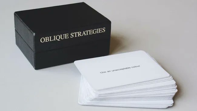 dark_shark's tweet photo. "I was standing crying at the synthesizer, so I pulled out a card and it said 'just carry on'. I did and created something I still like today": How Brian Eno's mysterious Oblique Strategies could help your music production and your life https://t.co/9l20P14ox1 https://t.co/Z7MCH1TYpO