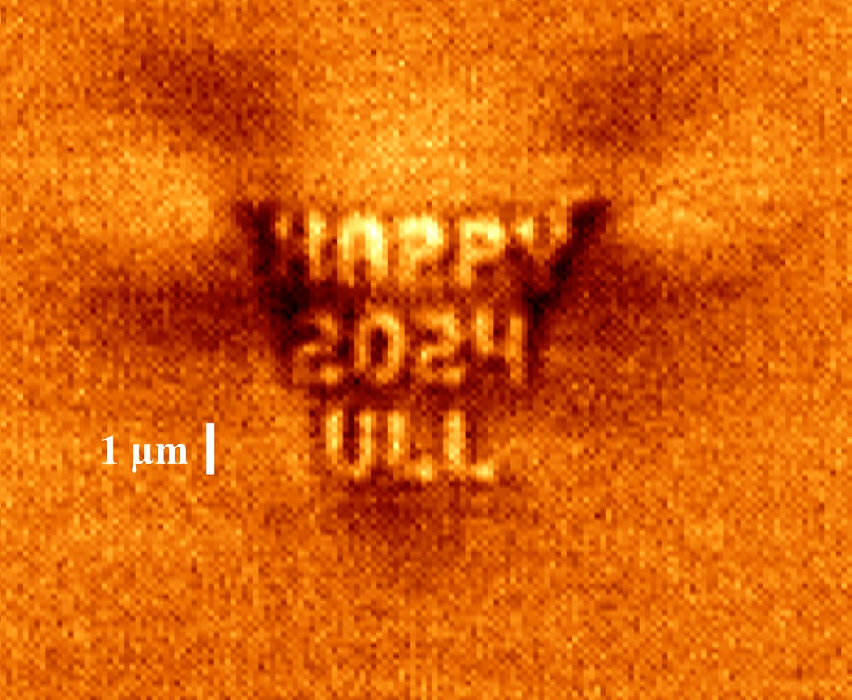 HAPPY 2024 !
from the <a href="/LEAPlab_ULL/">LeapLab</a> at <a href="/ULL/">Universidad de La Laguna</a>

Our greeting features the visible light transmission image of a 3D written letters inside a laser crystal with 160 nm line widths, total letter heights of 1 um, and very large depths of more than 20um!
What you see is light diffraction!