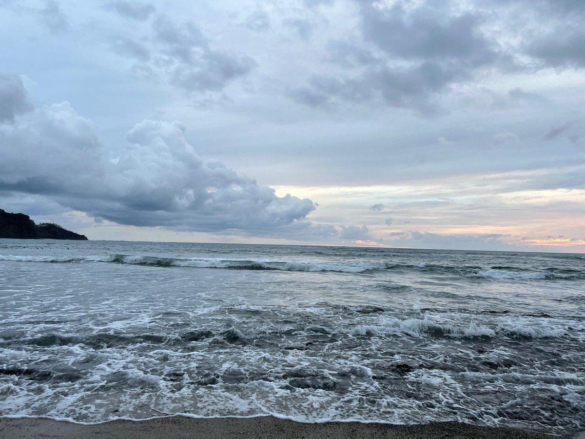 Even on a gray and rainy day the ocean at sunset is pretty in Nosara. Caption and photo by DR.