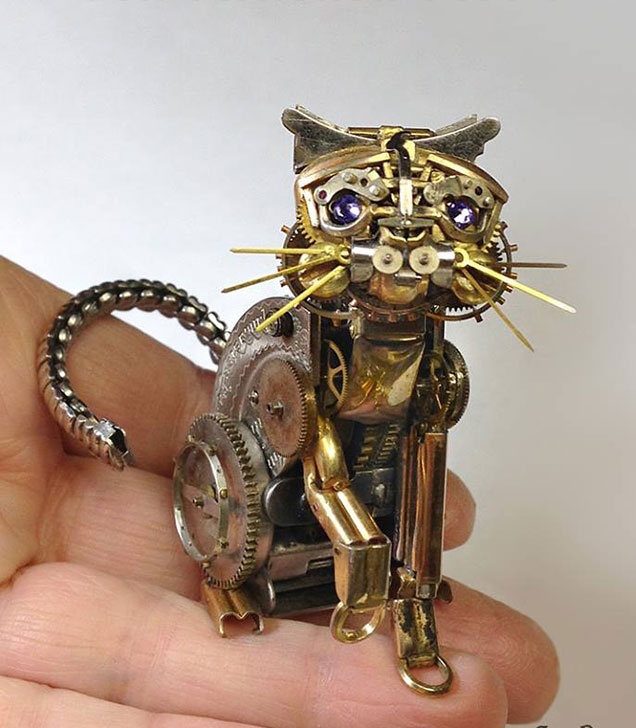 Steampunk cat by US artist Sue Beatrice who creates small sculptures and jewellery out of old watch parts #WomensArt