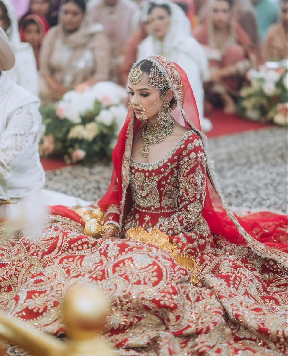 Love stands as the supreme victor; let us fully embrace its potent influence. 💖

Our lovely client looks stunning in Ali Xeeshan's outfit. Weddings are extraordinary moments in life, and in this enchanting, sparkling ensemble, she becomes the most beautiful #AliXeeshan bride.