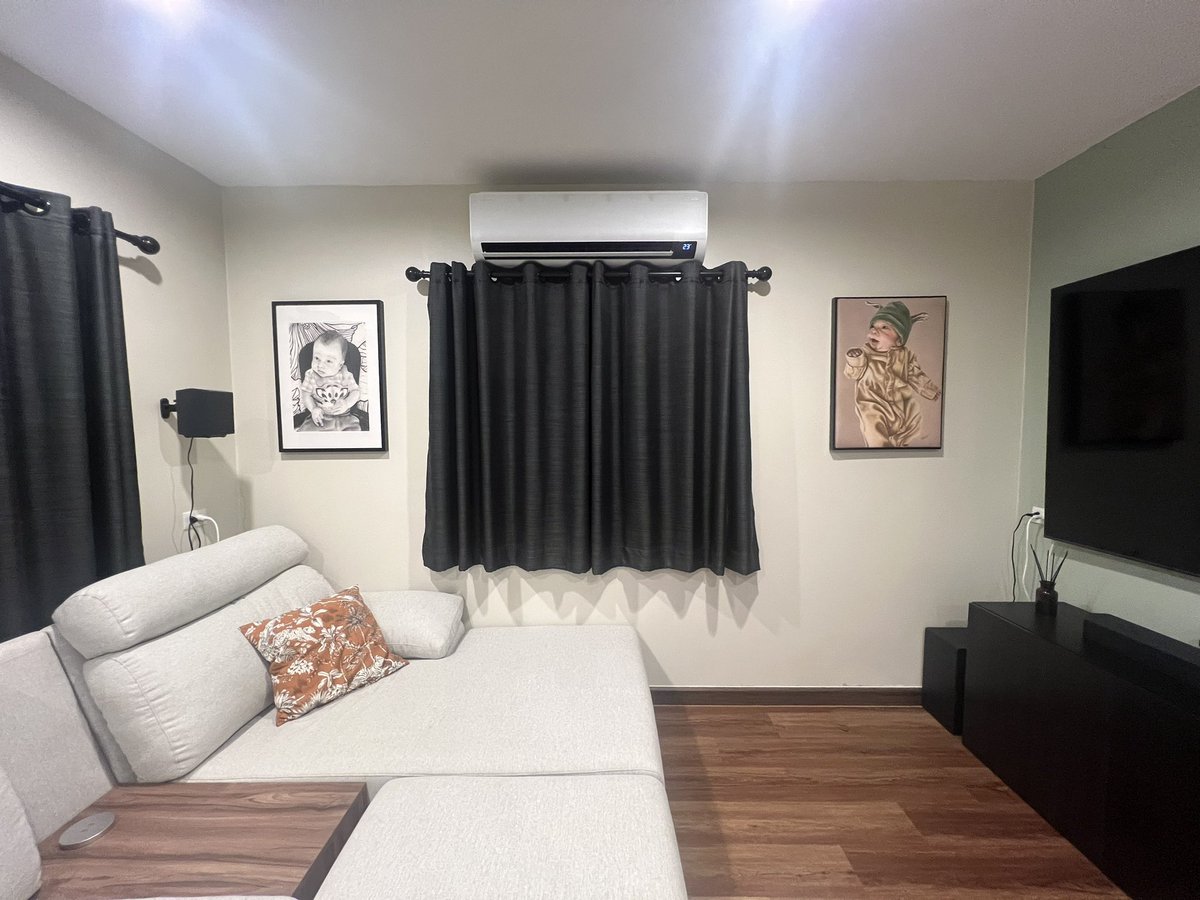 Putting up some of my artwork and giving our living room a bit more character 🖼️ 🎨 ✏️