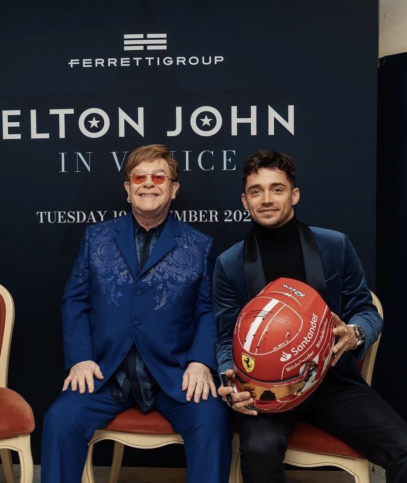 charles helmet swapping with elton john 😅 📸 via ch_leclerc16