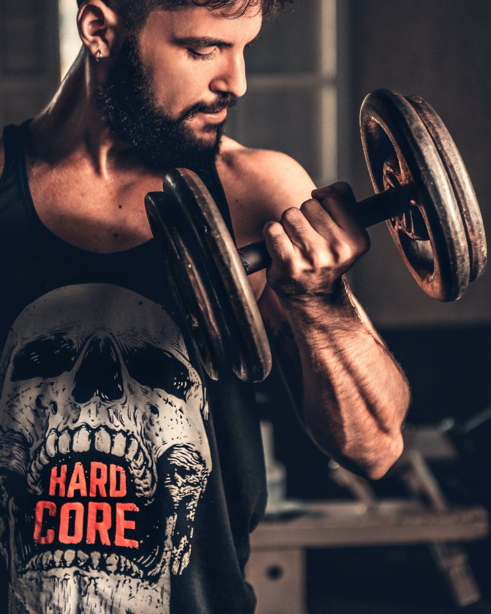 Focused curls, sculpting determination. Watch him shape strength with each lift. Share your favorite bicep exercises below! #DumbbellCurls #BicepSculpting #RomixFitness