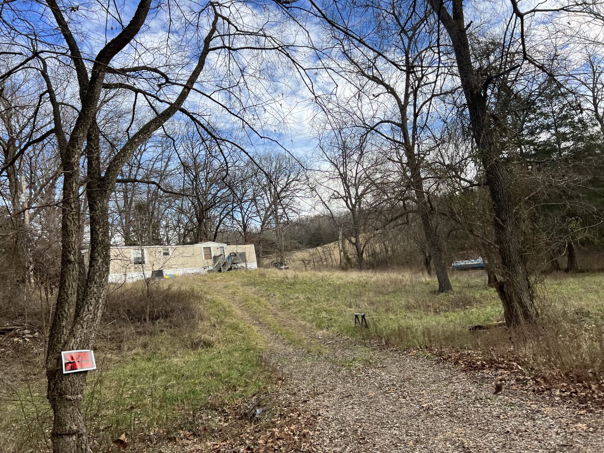 SendSunflowers's tweet photo. Dad’s neighbor who proudly flew a ⁦@realDonaldTrump⁩ flag outside of his trailer and donated to his campaign as recently as August. 

This home, and all of the garbage surrounding it was just foreclosed on. 

It’s a cult, MAGA! 

#trumpsmells #magaklan #insurrectionists https://t.co/Kd4kczlTGU