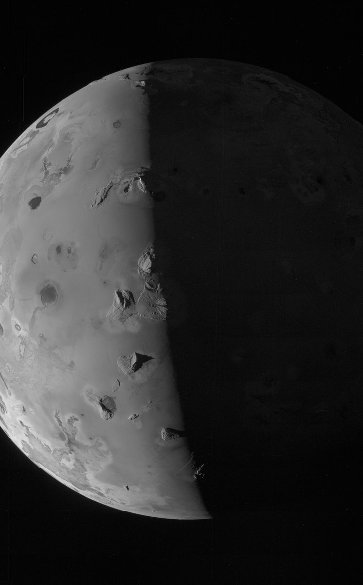 NASASolarSystem's tweet photo. The JunoCam instrument aboard our #JunoMission acquired six images of Jupiter's moon Io during its close encounter today. This black-and-white view was taken at an altitude of about 1,500 miles (2,500 kilometers). More images will be available soon at https://t.co/mGfITRe57Y https://t.co/9GcamrhxPt