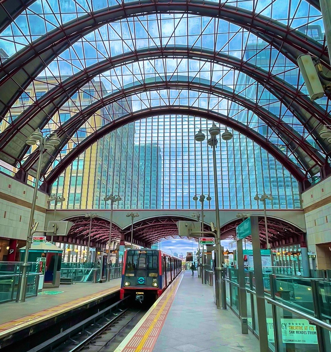 Trains in glass houses.

#london 
#docklandslightrailway 
#railways 
#transportation 
#canarywharf 
#photo 
#photography