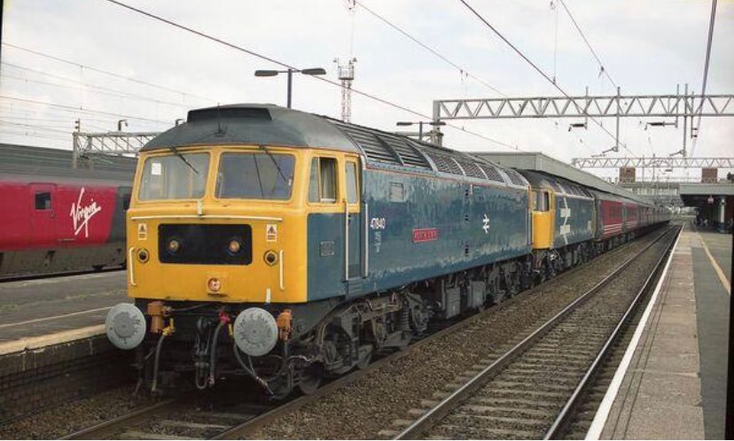 Super drag Sunday at Nuneaton in 2002. 47840 and 47847 wait to take the train onto Birmingham. Happy New year to you all have a good one and stay safe , Steve.
@NuneatonRailway #class47