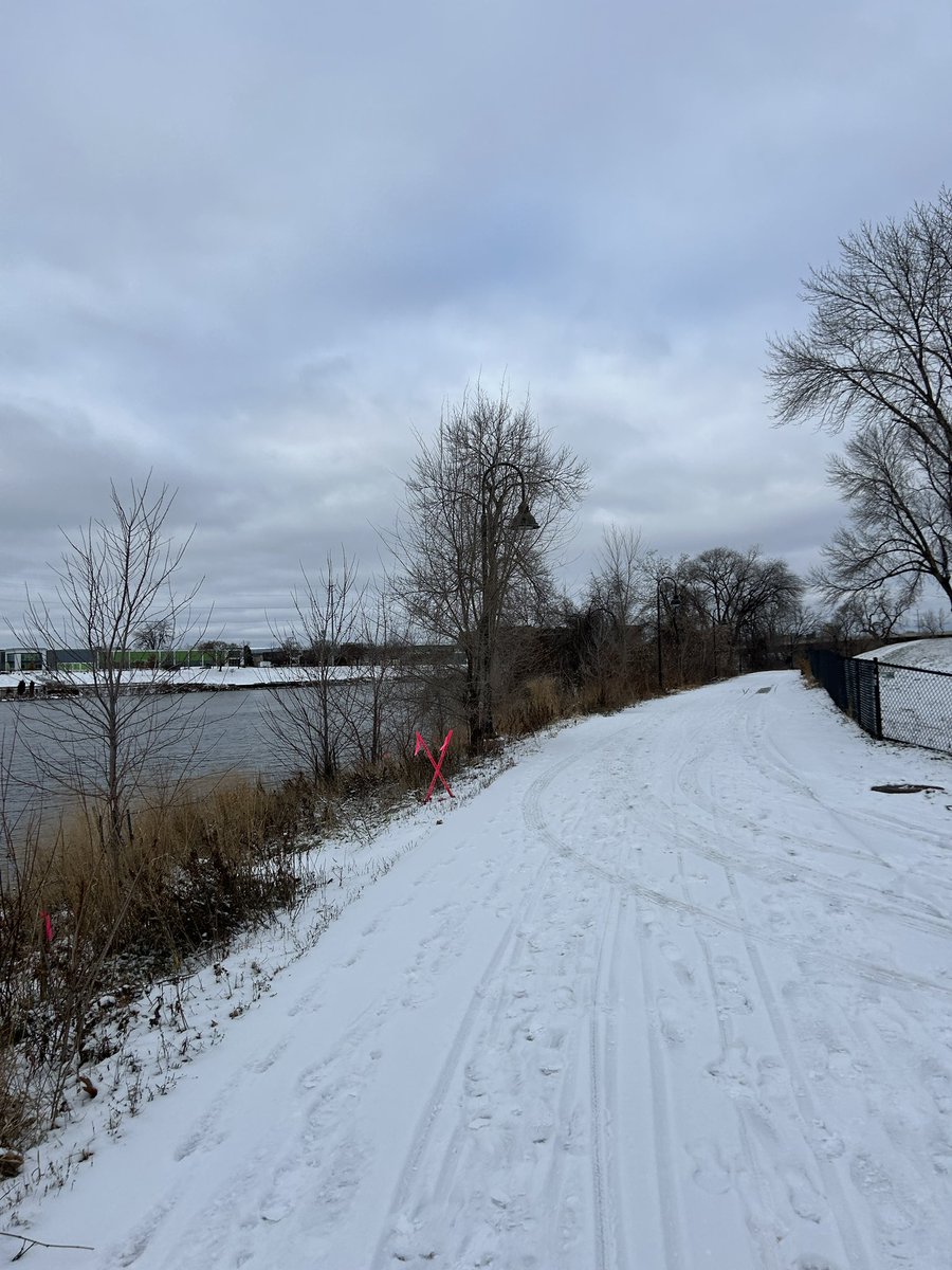 corinhoggard's tweet photo. The last #HogJog of 2023 was the first truly snowy time to #RunTheRiver.
The trails are beautiful, but a bit of a slog.
Even Stone Arch Bridge was covered in caked snow, but St. Anthony Falls is flowing fast and I saw a lot of dogs enjoying the new terrain. https://t.co/aI16jcilBO